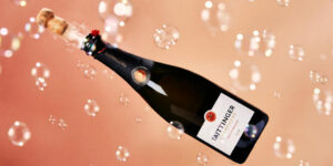 Delta celebra 100 años con marca de champán Taittinger